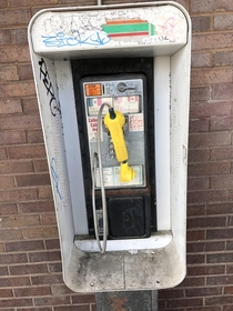 This vintage pay phone I found in the hood