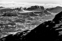 This was the moment I fell in love with Greenland a land where contrast thrives The Ilulissat Icefjord can be viewed from the tundra but it reveals something so vast and foreign that it appears to be a different planet 