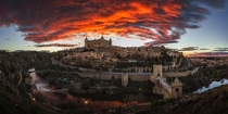Toledo under a Red Sky Spain   vertical handheld shot stiched pano
