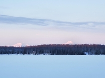 Took a picture earlier today of Denali and Foraker at my cabin Crystal lake Alaska 
