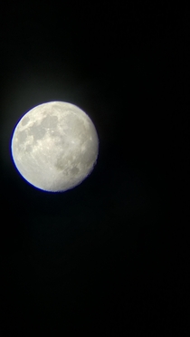 Took this picture through a telescope with my phone  hours ago when I was out with my stepfather