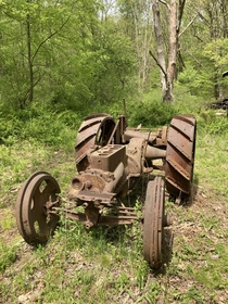 Tractor in an abandoned oil field Clear creek state Forest Pennsylvania