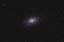 Triangulum Galaxy photographed from the desert on the outskirts of Dubai