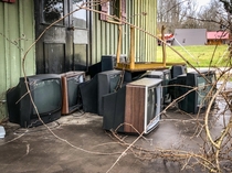 TVs living on the porch of a deserted motel in The Smoky Mountains