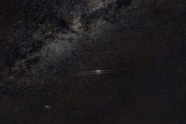 Twin Iridium Flares under the Milky Way with M in the lower left 