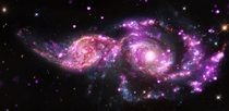 Two spiral galaxies in the process of merging NGC  and IC  December   