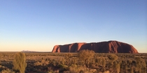 Uluru at sunrise  Kata Tjuta in background NT Australia 