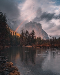 Valley View with a rainbow during a rain storm Yosemite California 