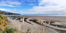 Volcanic sand ripple patterns on a beach in Raglan New Zealand 