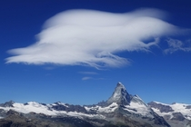 Waves of clouds over Mount Matterhorn in Switzerland 