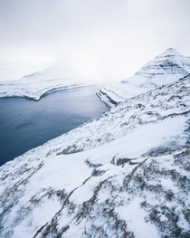 Whiteout in  Funningursfjord on a very snowy winter day at the Faroe islands 
