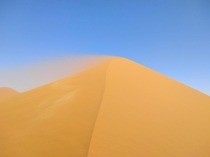 Wind blowing Dune  at Sossusvlei Namibia 