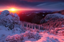 Winter sunset over Ceahlu Massif in Romania  by Lazar Ovidiu